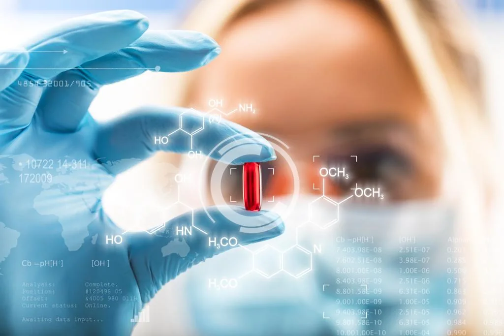 Laboratory technician in gloves and mask examining a sample