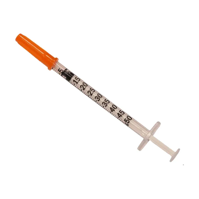 Insulin syringe with orange cap
